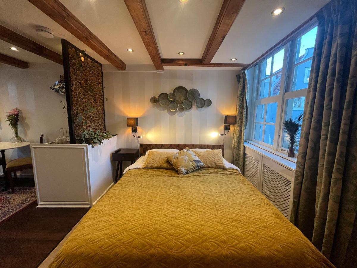 The Enlightened House Luxury Suites Amesterdão Exterior foto